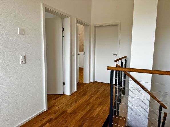 Türenprojekt Roser AG Überbauung Böschmatt Sissach Weiss lackierte Innentüren im modernen Wohnbau