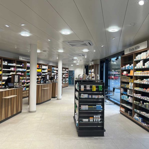 Interior fittings pharmacy in Bern with French walnut