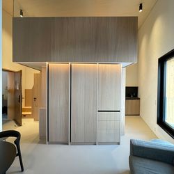 Frame flats in Andermatt, interior fittings with Roser oak veneer