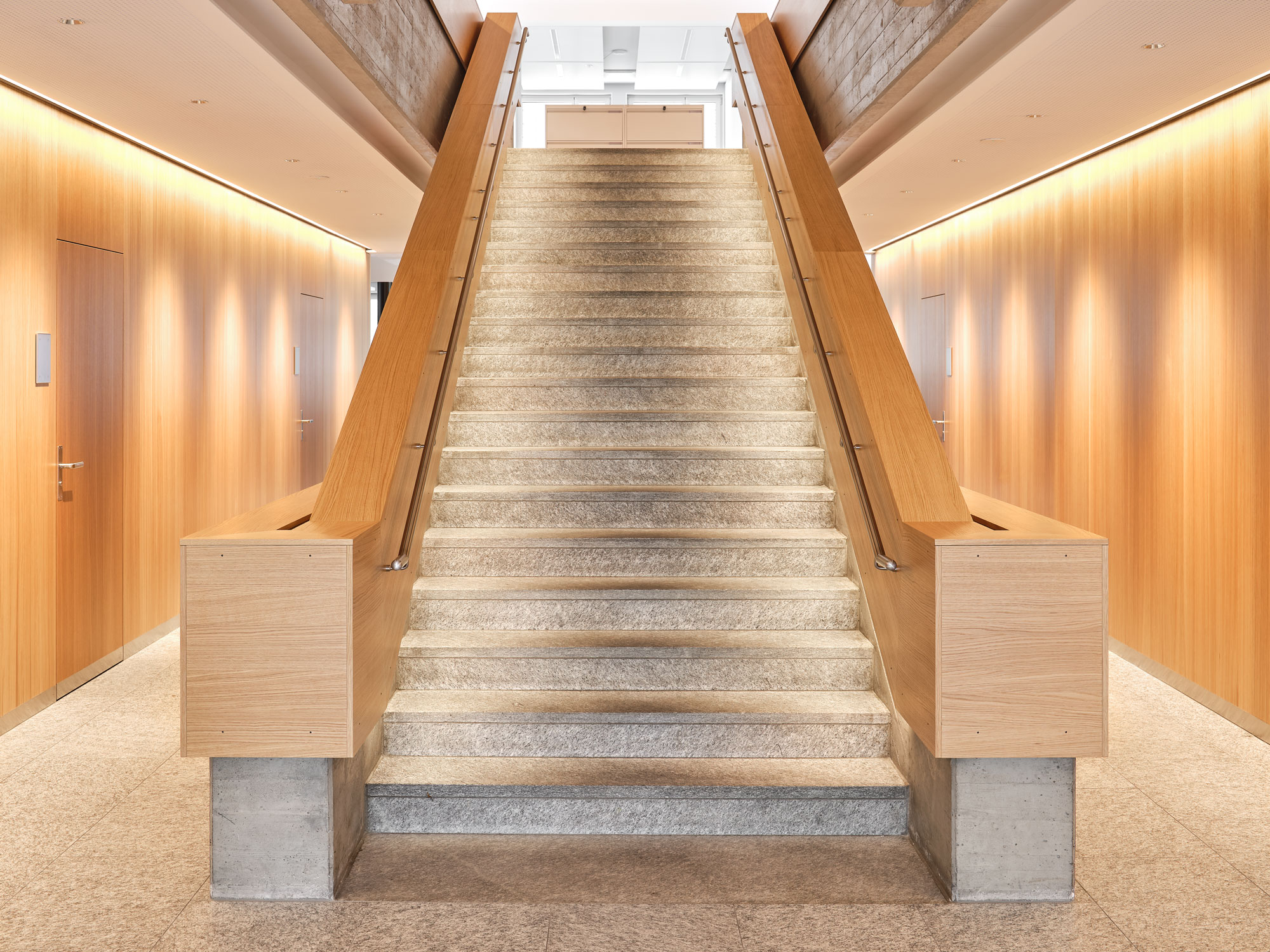 Solid oak veneer, Muri Community Centre Continuous oak veneer across seven storeys in the interior fit-out of the Muri community centre